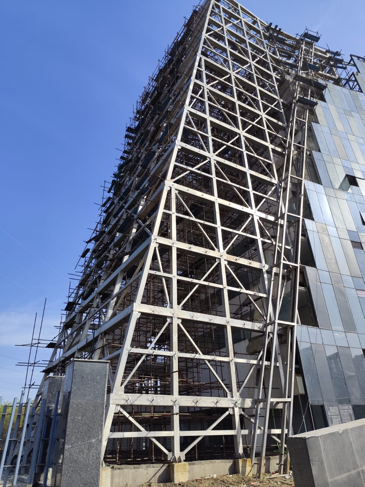 recently completed Noida Authority office new building Structure fabrication and erection of SS304 Structure 350 ton